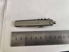 ANCIEN COUTEAU PLIANT MULTIFONCTIONS PUBLICITAIRE EN METAL MONTABERT