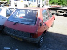 Fusee avant gauche PEUGEOT 205 PHASE 2