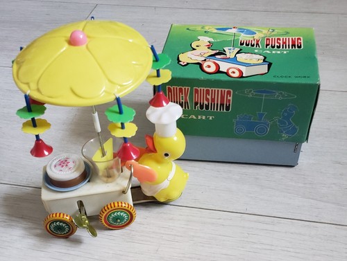 Ancien jouet mécanique duck - ancien,