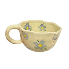 Tasse à thé pincée à la