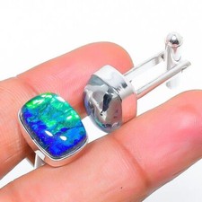 Boutons de manchette faits