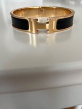 bracelets hermes clic h noir et doré 