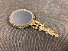 Ancien petit miroir face à