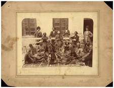 Group of men smoking hookah