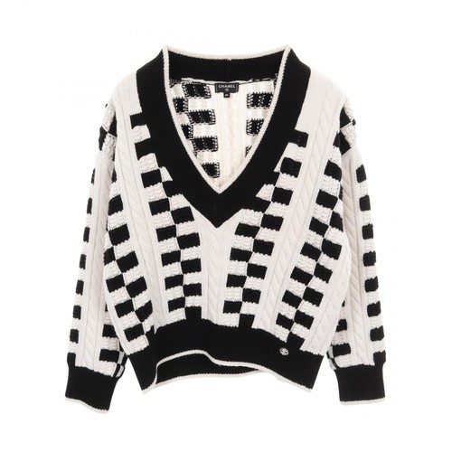 Pull tricoté bouton marque
