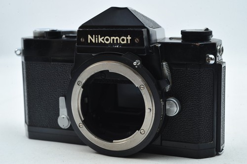 Appareil photo reflex - @,