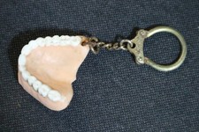 ancien porte cle publicitaire COLLECTION MACHOIRE BOUCHE DENT DENTISTE