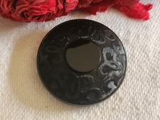 Bouton vintage en verre noir