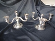 2 candelabres/bougeoirs 3 feux
