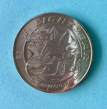 77  - JETON TOURISTIQUE -