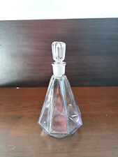 Flacon en verre à pans coupés , couleur violine clair , contenance  de 200 ml.