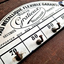 Présentoir mural émaillé 