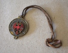 Médaille de ski autrichien ULLR avec son cordon en cuir d'origine... Vintage