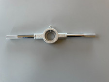 Porte filière poignée acier