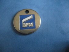Jeton de caddie : B F M