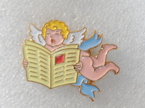 Pin ange qui lit - pin's,
