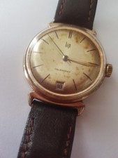 MONTRE MECANIQUE HOMME  LIP  MECANISME  R23G CALENDRIER  1955-1960 PLAQUE OR