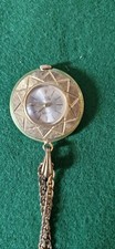 Montre pendentif femme + chaîne "Lancel" en plaqué or