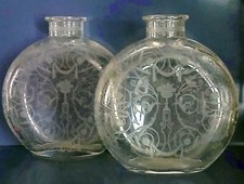 Flacons, modèle "Michelangelo" en cristal soufflé de Baccarat.