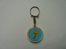 Ancien porte clé inclusion AN. 60 PETIT DIABLE VETEMENTS  VOIR DOS