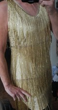Robe  recouverte de filets or 36/38 pour soirées ou réveillons style charleston