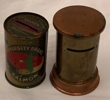 Two antique piggy banks, the first is a rare antique vintage Parsley Brand Salmo