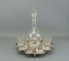 Superbe service à liqueur en cristal et métal argenté, style Louis XV. 