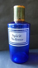 Pot à pharmacie verre bleu XIXe étiquette vitrifiée Spirit Melissae Legras