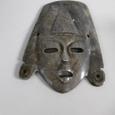 masque mural inca en pierre