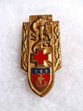 Un insigne militaire " 1er