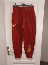Jogging Femme Nike Doré Et