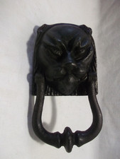 heurtoir de porte tête