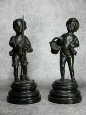 CLODION. ENFANT VENDANGEUR ET ENFANT PÊCHEUR. PAIRE STATUETTES BRONZE PATINE.