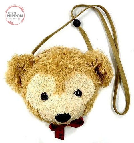 Peluche visage ruban rouge