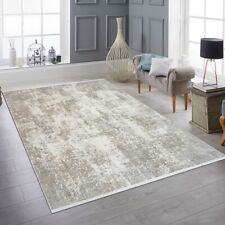 Tapis moderne salon motif abstrait dans des tons discrets de beige et de creme