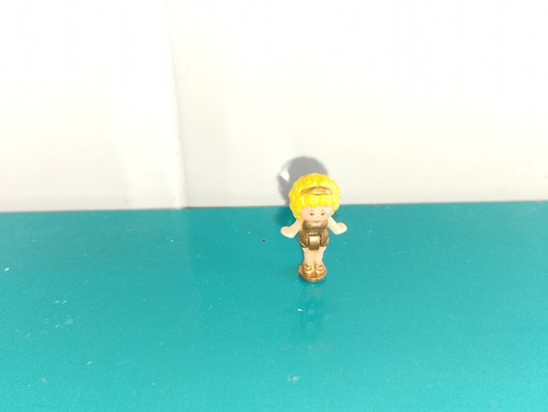 Polly pocket figurine doll