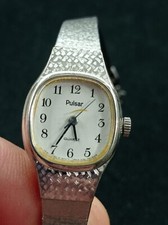 ANCIENNE MONTRE PULSAR QUARTZ - REF09773J