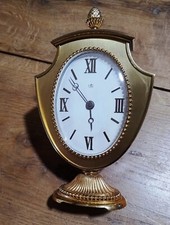 Pendule à poser 8 jours marque SWIZA UTI, laiton poli/doré, Suisse, années 50-60