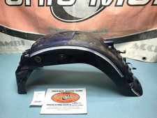 Garde-boue arrière fissuré