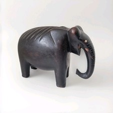 statue éléphant en bois d'ébène  massif  formes épurée moderniste .