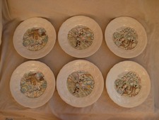 SERIE DE 6 ASSIETTES A DESSERT EN FAIENCE DE GIEN, STYLE M.P BOITARD, XXème.