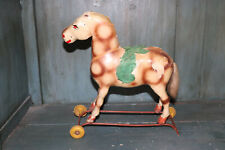 Jouet d'enfant ancien cheval en carton bouilli a roulettes Vintage 1920
