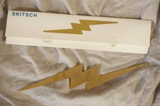 COUPE PAPIER ECLAIR COUPE DE FOUDRE MANGIAROTTI ARICO OBJET DESIGN SKITSCH 2010