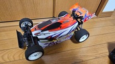 Voiture RC électrique tout-terrain Tamiya Rising Storm 1/10 orange blanc