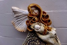 Ange céramique avec bébé à