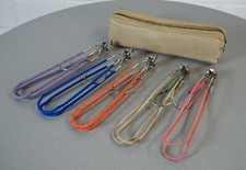 5 anciens cintres de voyage