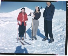 Merle Oberon skiing on slopes