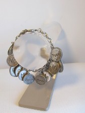 bracelet breloques poggi métal argenté