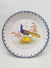 Ancienne assiette en terre cuite émaillée, décor d'oiseau polychrome 22 cm