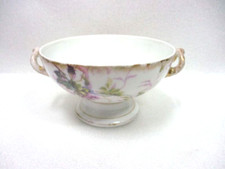 Bol avec anses en porcelaine